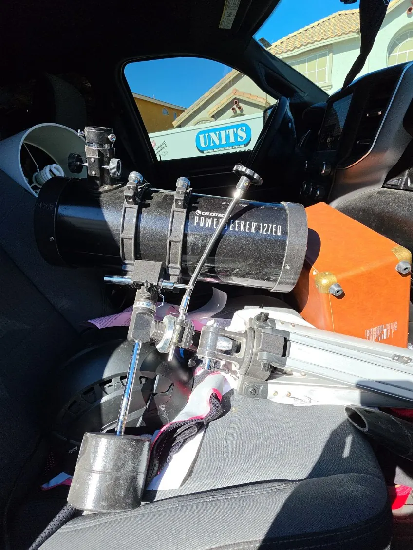 A telescope riding in the cab with the rest of the load