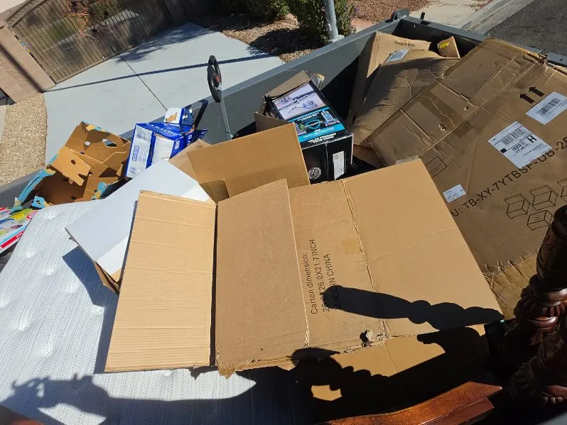Broken down cardboard boxes loaded in the trailer