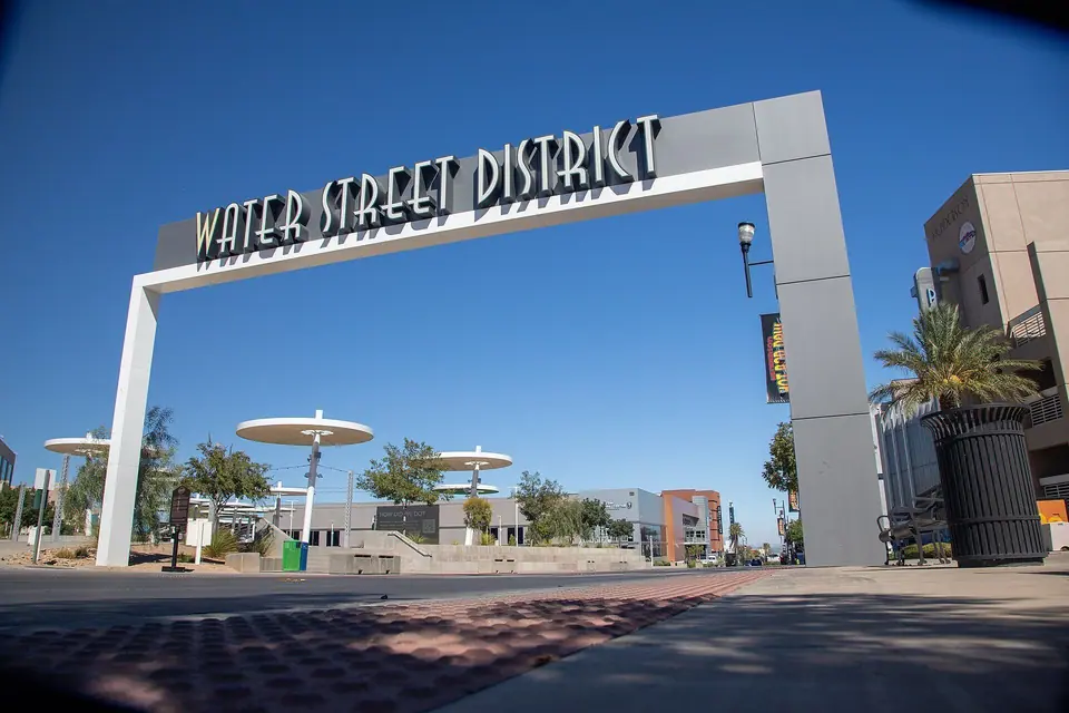 The "Water Street District" gateway arch in downtown Henderson between City Hall and the city court, daytime blue sky, Henderson, NV